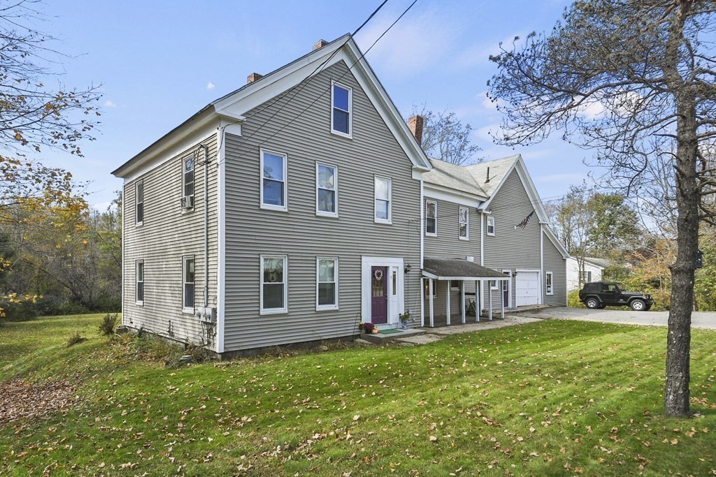 75 Main Street Templeton, MA 01436 - Photo 2 of 33 a front view of house with yard and green space
