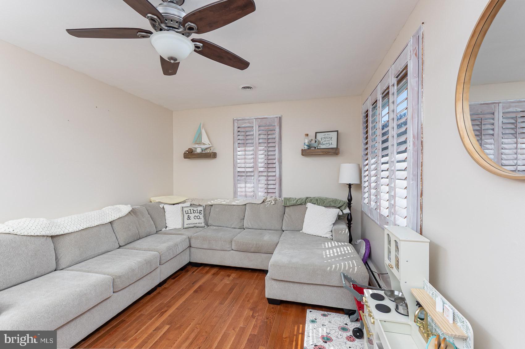 1626 Cape May Road Baltimore, MD 21221 - Photo 15 of 37 Living Room with Plantation Shutters