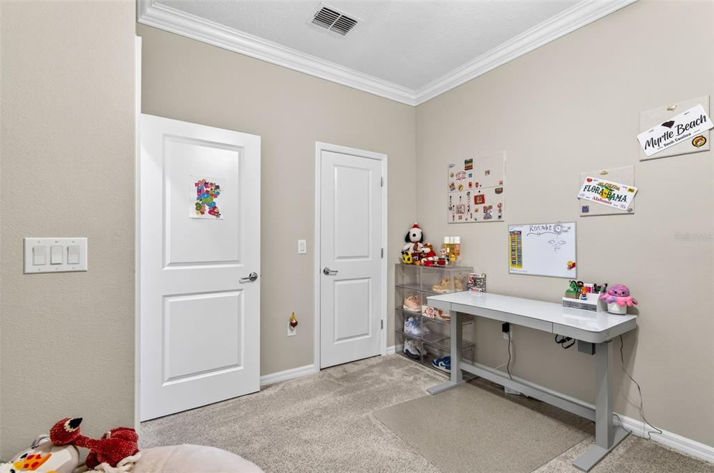 6427 Mooring Line Circle Apollo Beach, FL 33572 - Photo 22 of 34 a room with a window and dresser