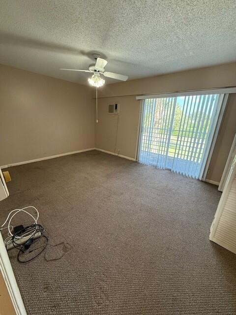 59 Brighton B, Unit B Boca Raton, FL 33434 - Photo 2 of 5 a view of a livingroom with a ceiling fan and window