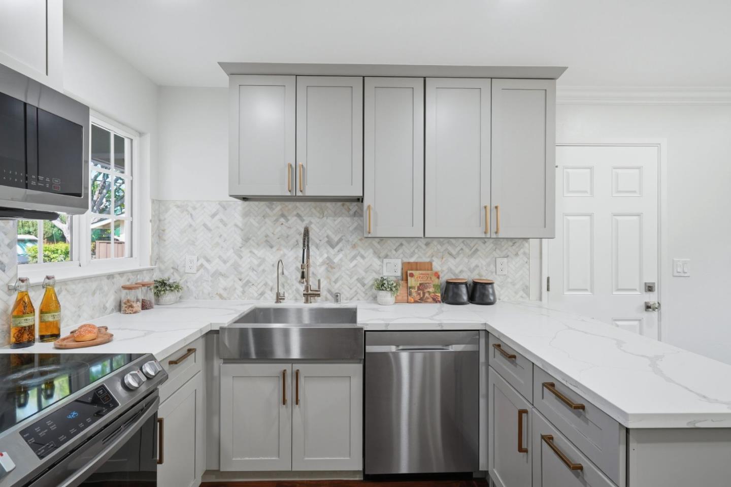 3802 West Rincon Avenue Campbell, CA 95008 - Photo 11 of 27 a kitchen with a sink cabinets and appliances