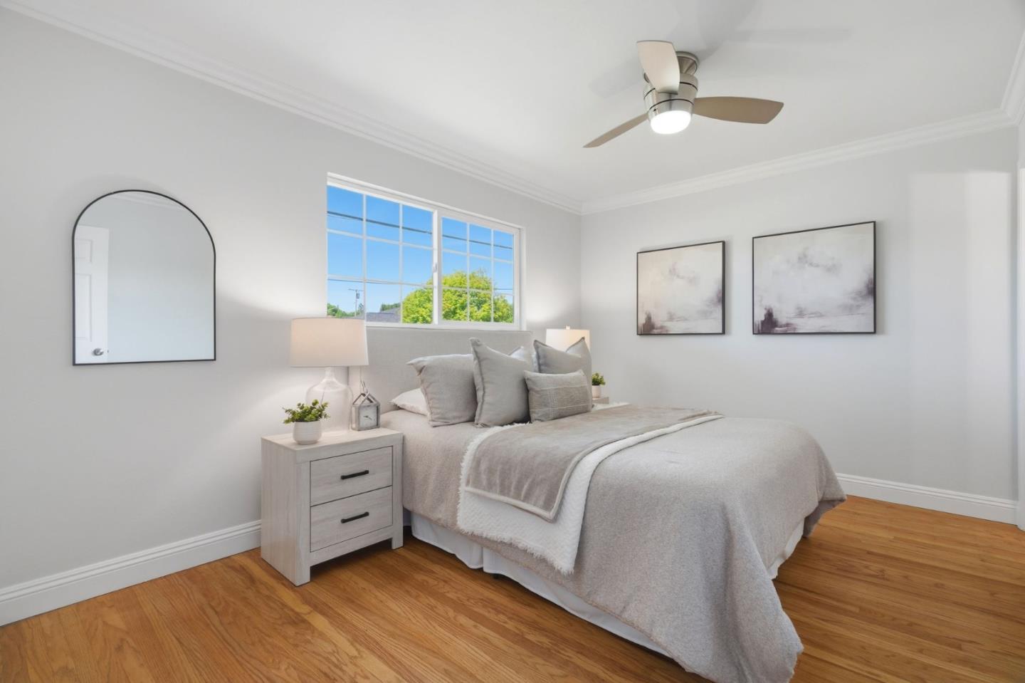 3802 West Rincon Avenue Campbell, CA 95008 - Photo 14 of 27 a bedroom with a bed and a dresser