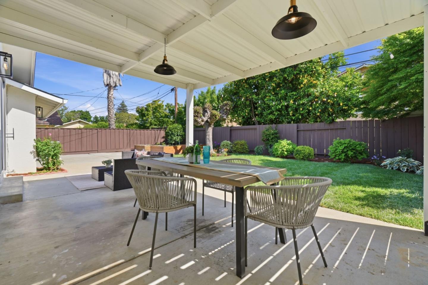 3802 West Rincon Avenue San Jose, CA 95008 - Photo 19 of 26 a outdoor space with a table and chairs
