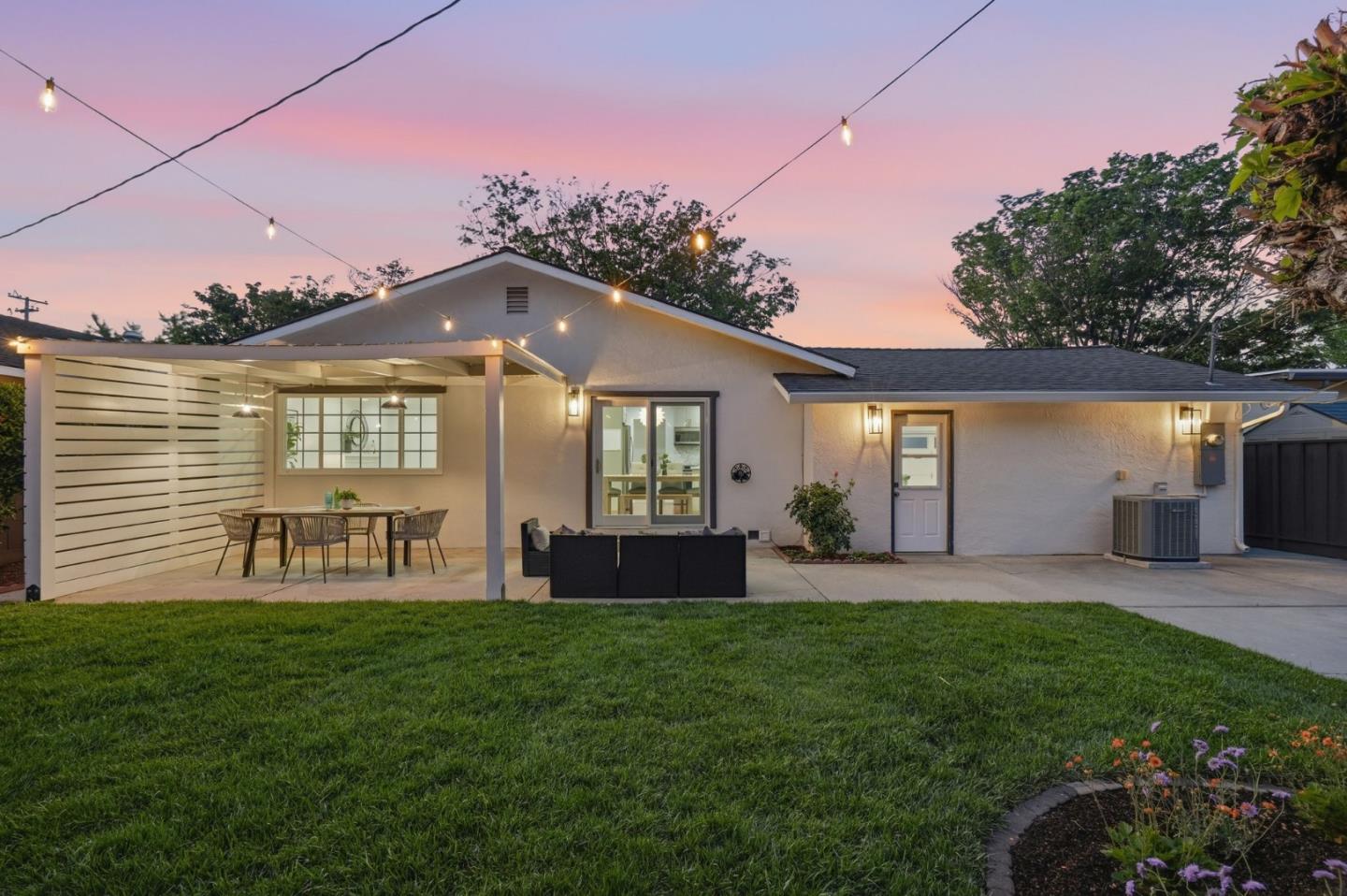 3802 West Rincon Avenue San Jose, CA 95008 - Photo 20 of 26 a front view of house with yard and outdoor seating