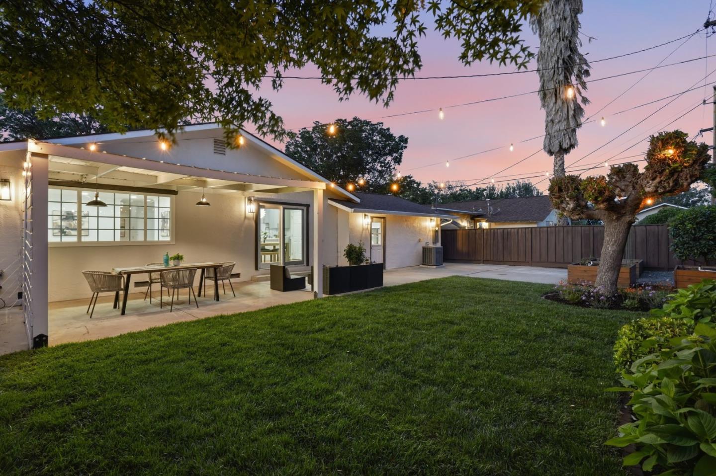 3802 West Rincon Avenue San Jose, CA 95008 - Photo 21 of 26 a front view of a house with garden and a garden