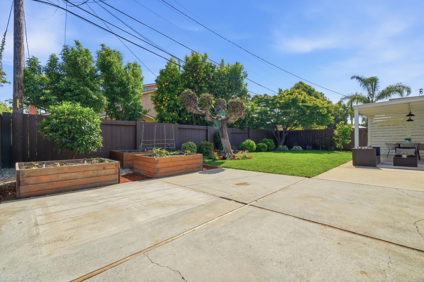 3802 West Rincon Avenue San Jose, CA 95008 - Photo 24 of 26 a view of a backyard with plants and garden