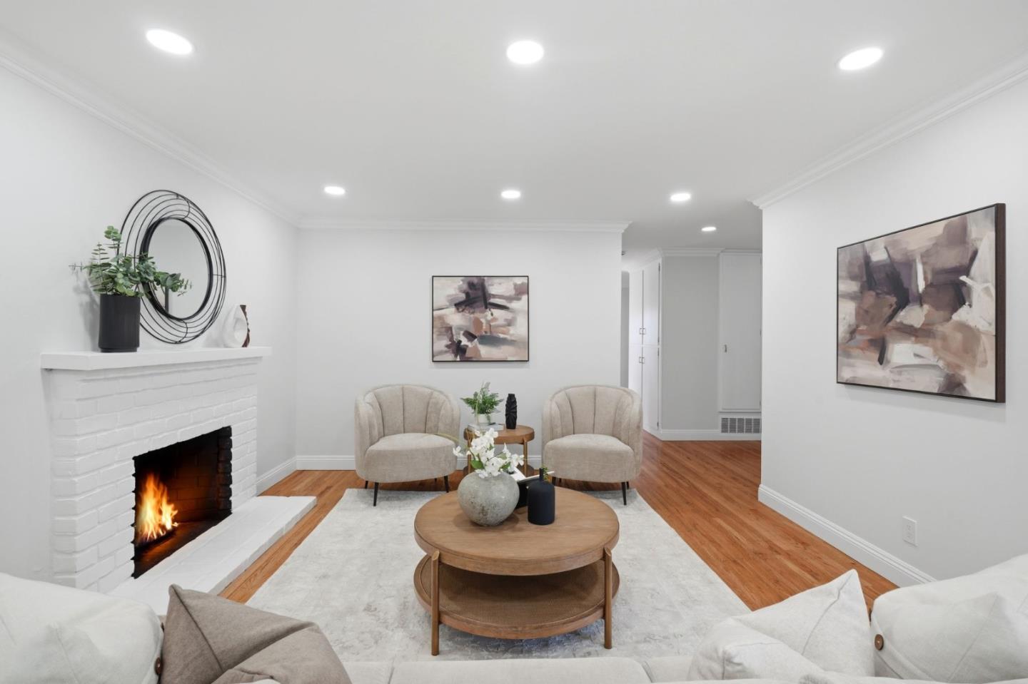 3802 West Rincon Avenue San Jose, CA 95008 - Photo 3 of 26 a living room with furniture and a fireplace