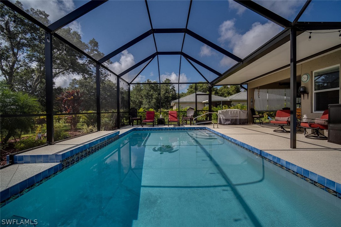 1212 Oceanic Road Punta Gorda, FL 33983 - Photo 23 of 29 a view of swimming pool with a patio