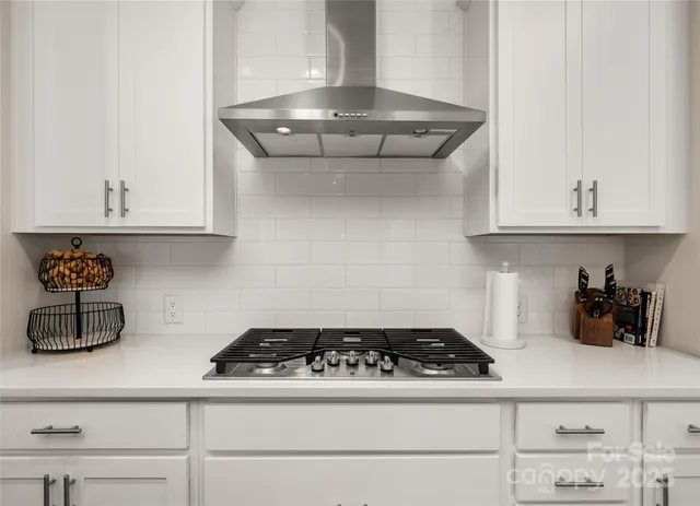 a bedroom with a bed and flat screen tv