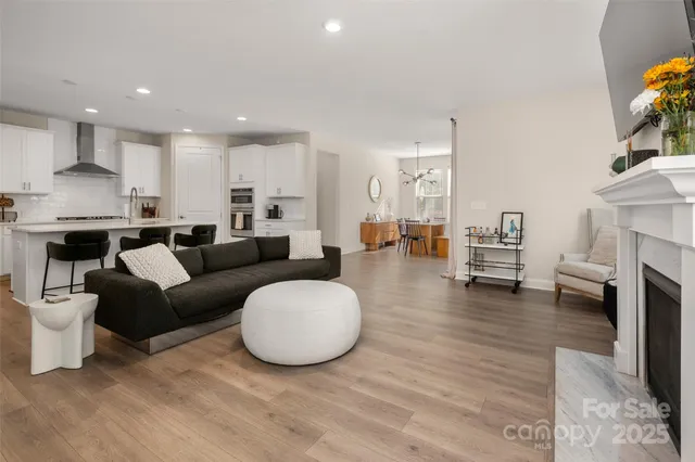 a en suite bathroom with double sink a and a large mirror