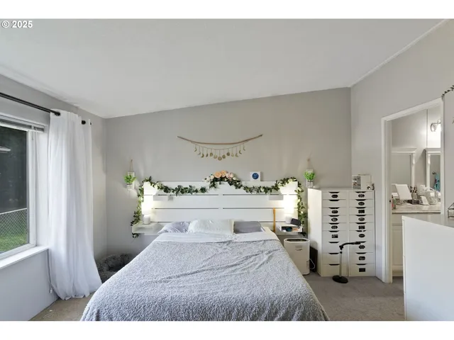 a view of living room with furniture and window