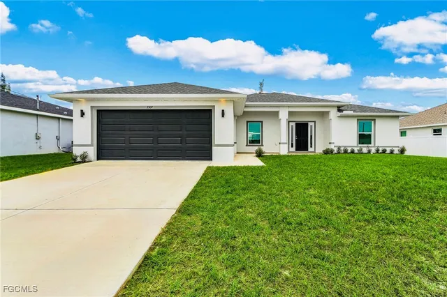 a house view with a garden space
