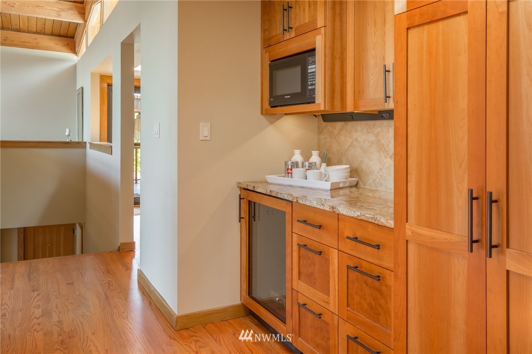 3500 West Commodore Way Seattle, WA 98199 - Photo 12 of 25 a bathroom with a sink and a mirror