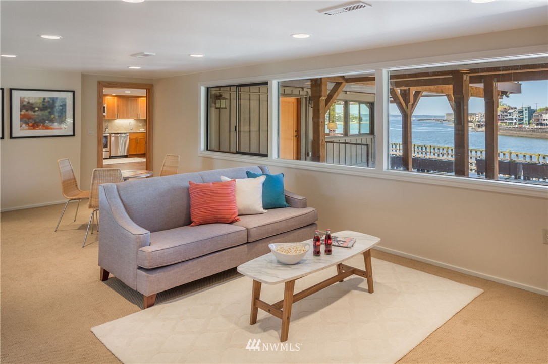 3500 West Commodore Way Seattle, WA 98199 - Photo 17 of 25 a living room with furniture and a window