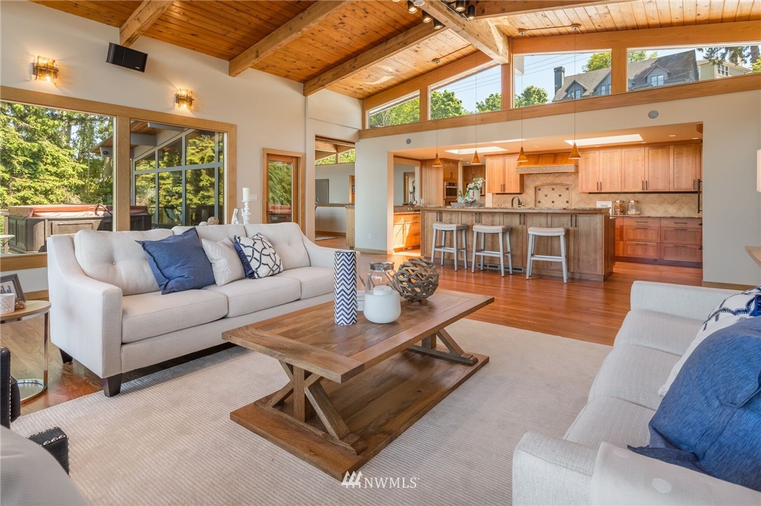 3500 West Commodore Way Seattle, WA 98199 - Photo 5 of 25 a living room with furniture and large windows