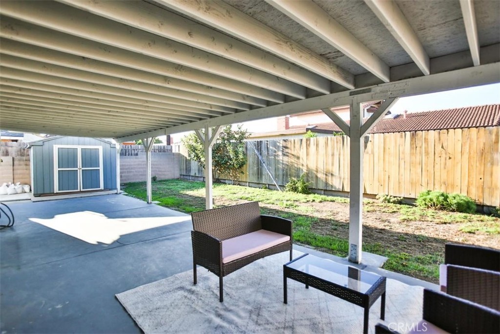 9485 Geranium Circle Fountain Valley, CA 92708 - Photo 34 of 36 a outdoor space with patio the couches and pool