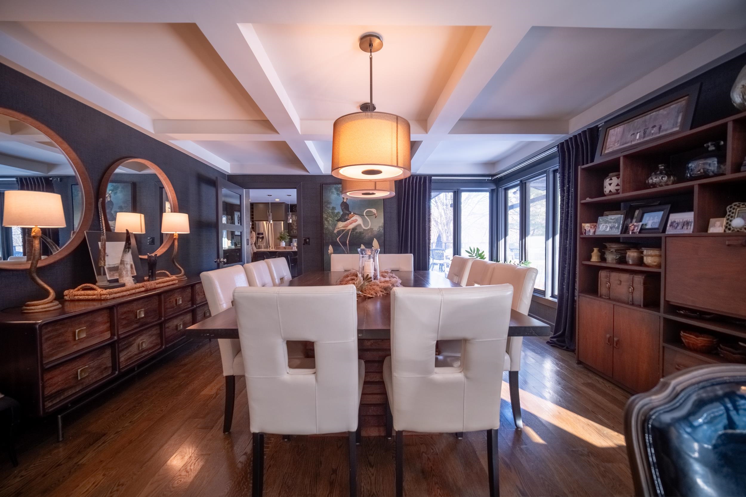 6811 West Gate Road Roscoe, IL 61073 - Photo 15 of 61 a view of a dining room with furniture and wooden floor