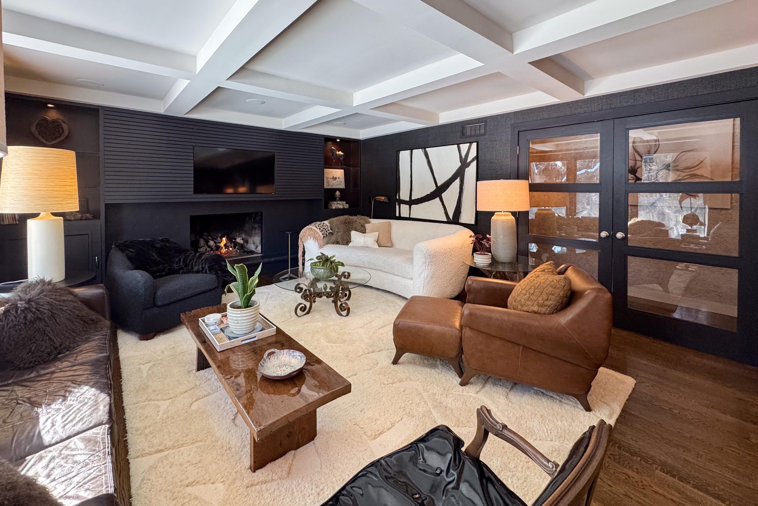 6811 West Gate Road Roscoe, IL 61073 - Photo 20 of 61 a living room with furniture a flat screen tv and a large window