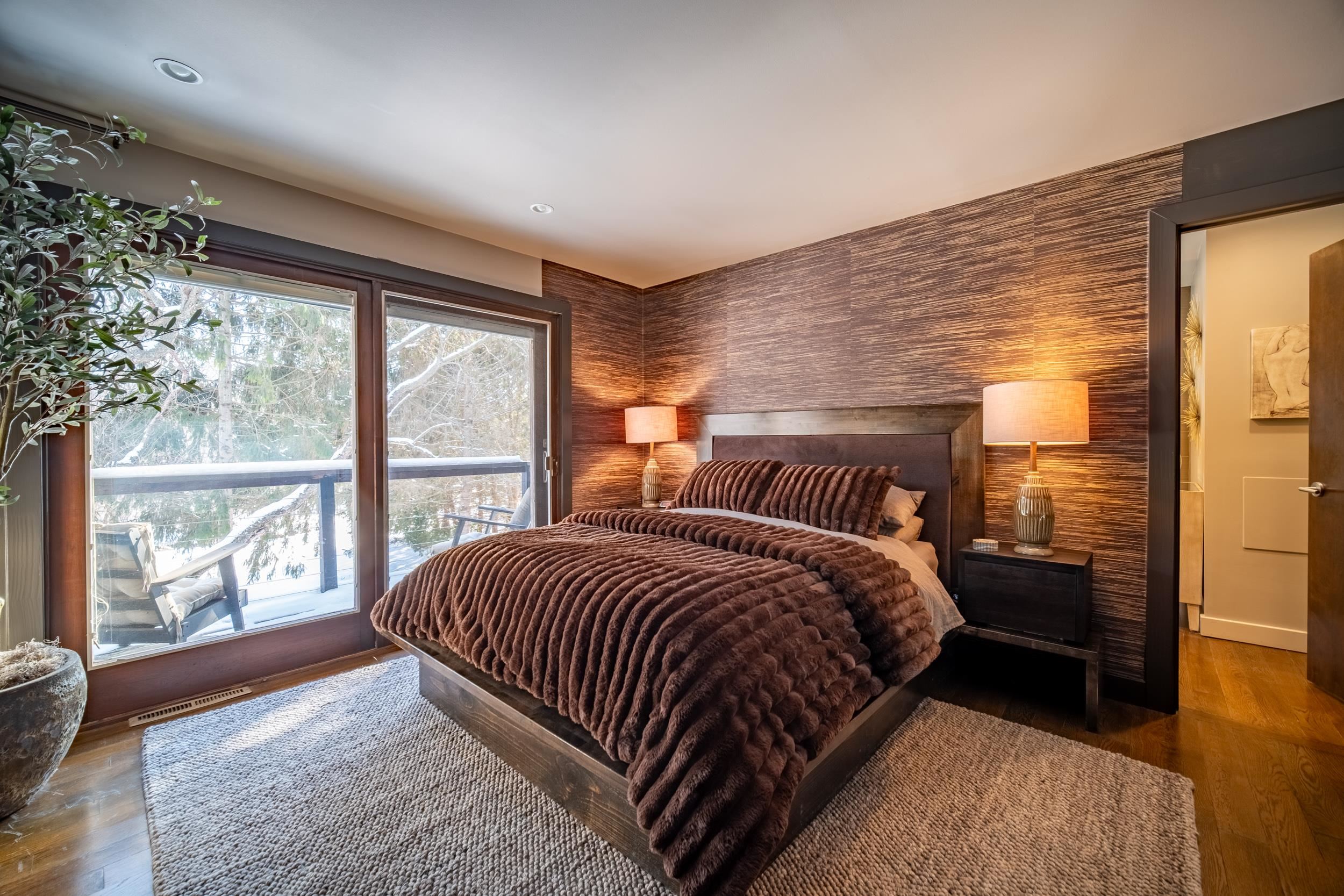 6811 West Gate Road Roscoe, IL 61073 - Photo 21 of 61 a bedroom with a bed and wooden floor