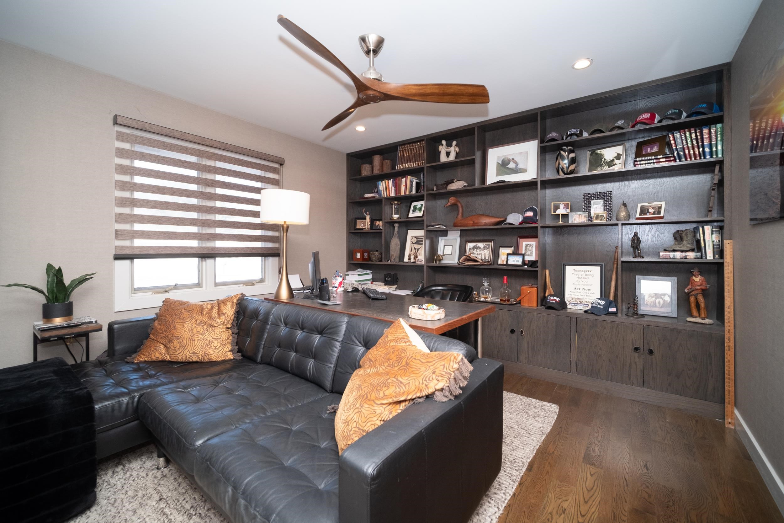6811 West Gate Road Roscoe, IL 61073 - Photo 29 of 61 a living room with furniture cabinets and window