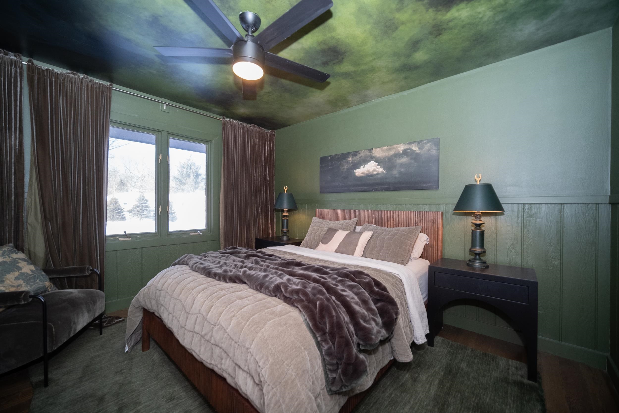 6811 West Gate Road Roscoe, IL 61073 - Photo 31 of 61 a bedroom with a bed and a chandelier