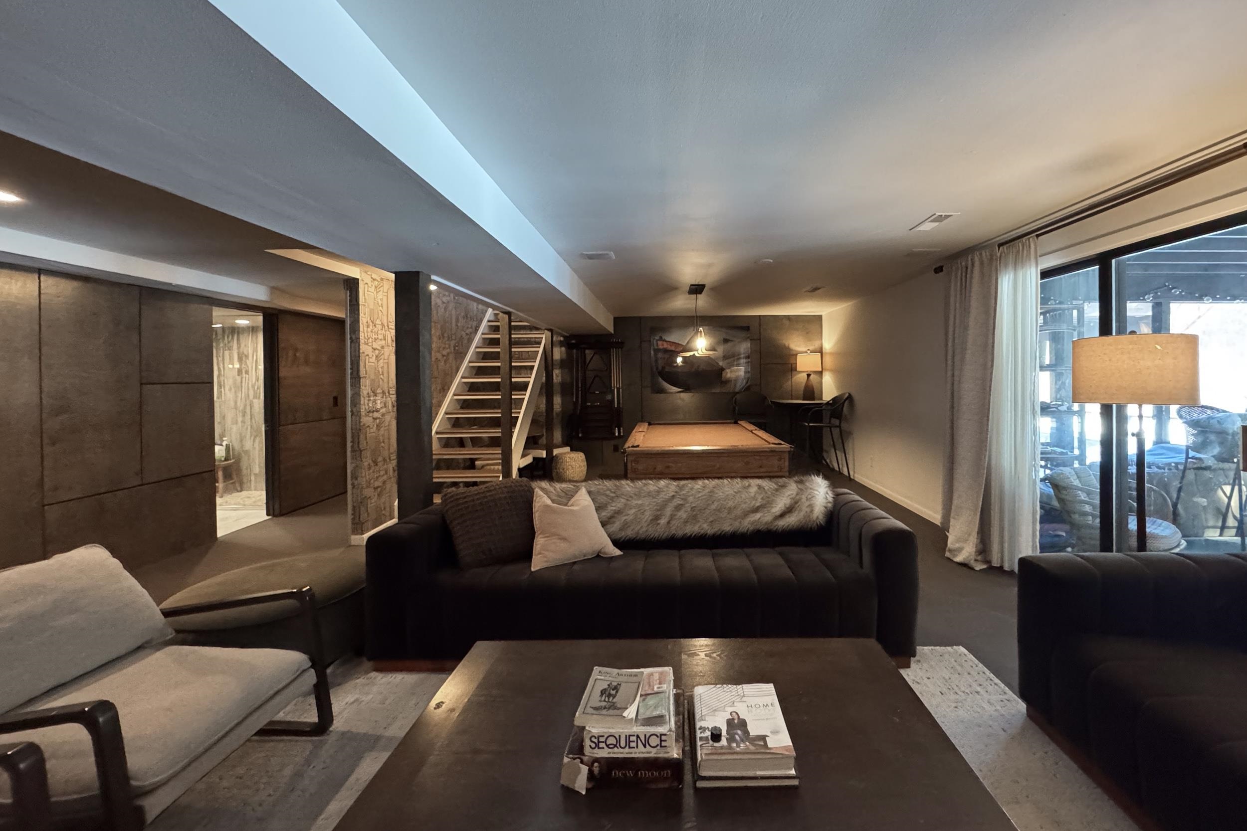 6811 West Gate Road Roscoe, IL 61073 - Photo 43 of 61 a living room with furniture and a chandelier