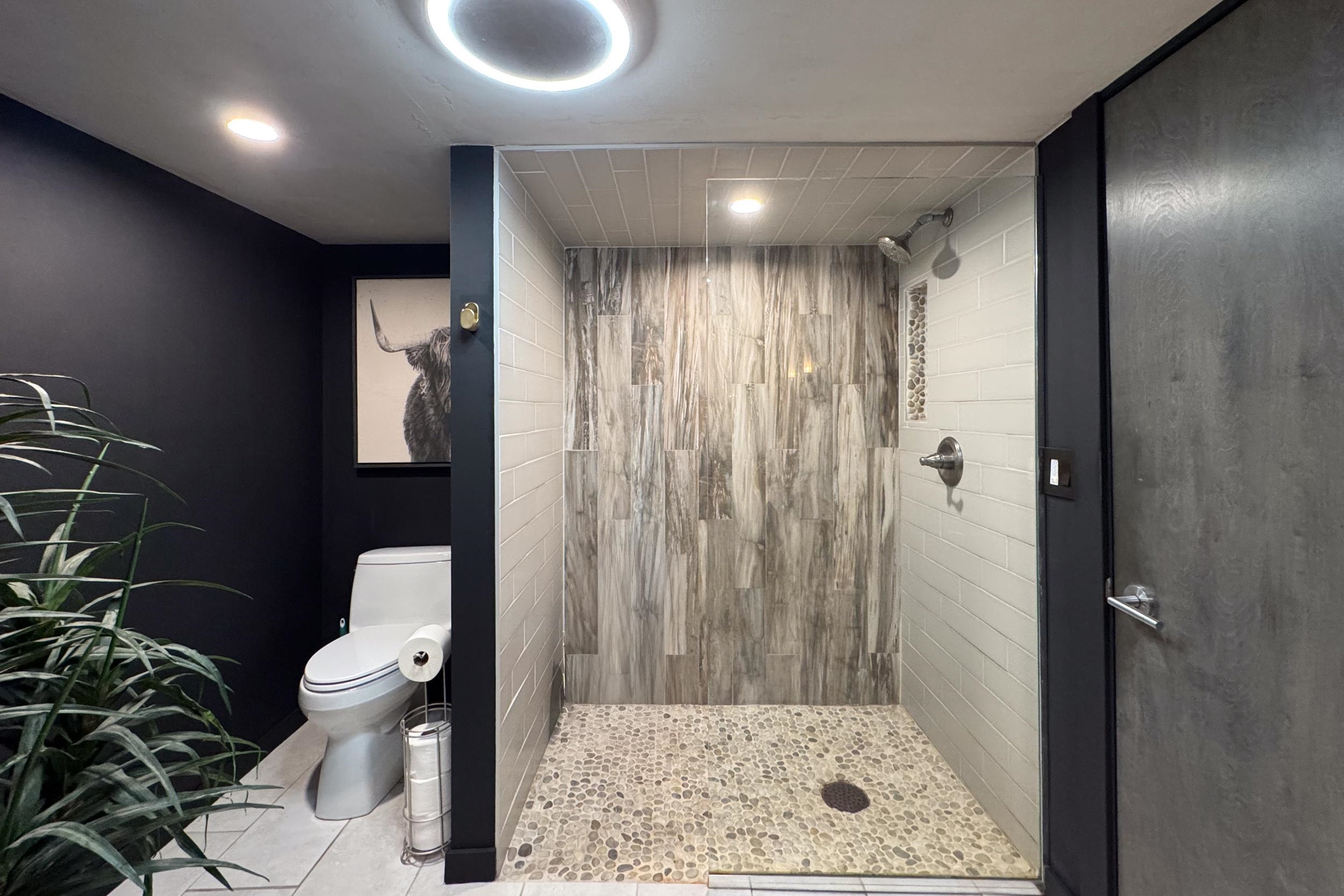 6811 West Gate Road Roscoe, IL 61073 - Photo 47 of 61 a bathroom with a toilet and a shower