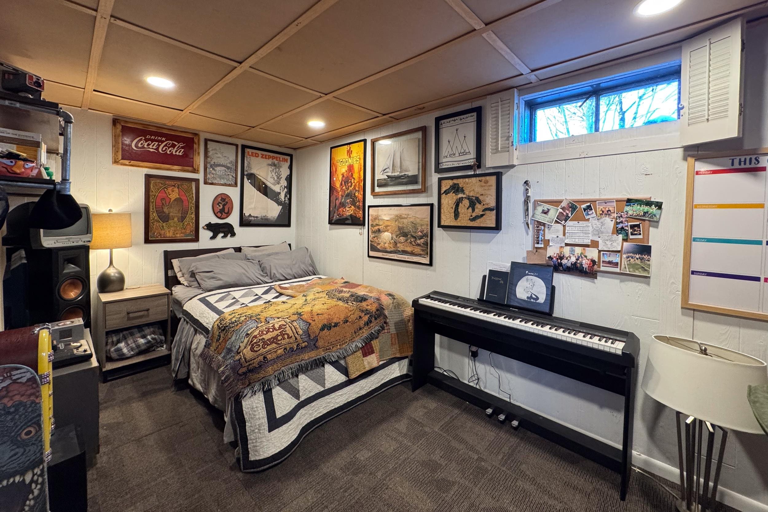 6811 West Gate Road Roscoe, IL 61073 - Photo 50 of 61 a spacious bedroom with a bed and a walk in closet