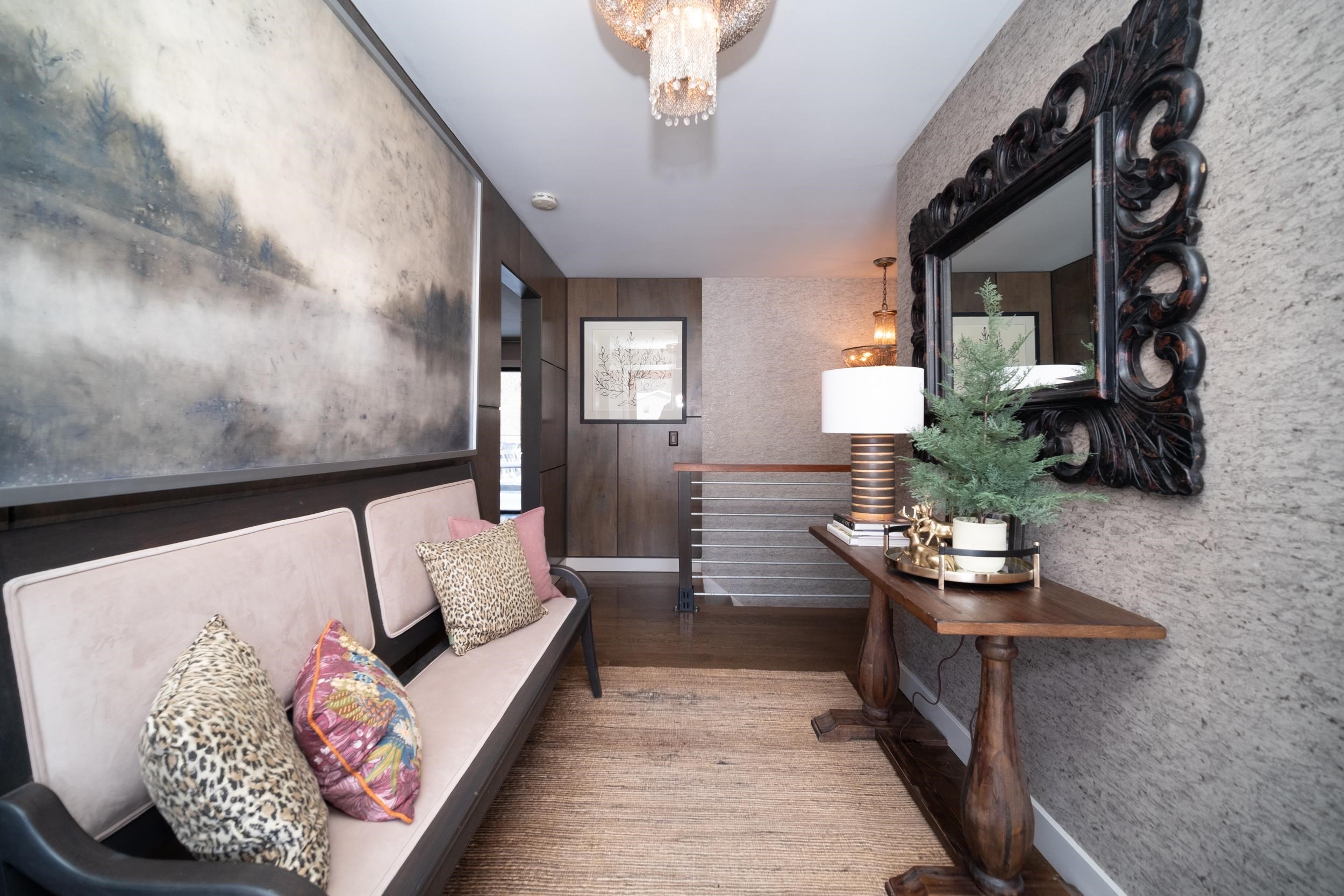 6811 West Gate Road Roscoe, IL 61073 - Photo 5 of 61 a living room with furniture and a chandelier