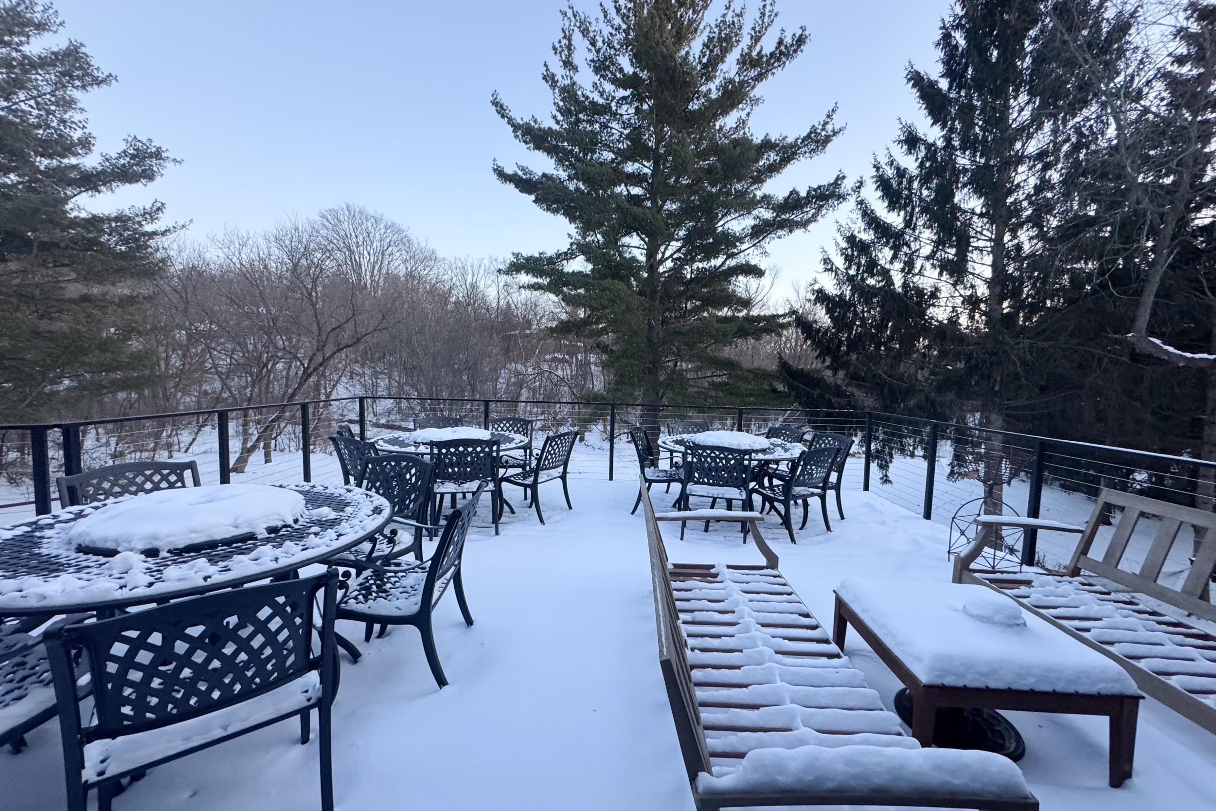 6811 West Gate Road Roscoe, IL 61073 - Photo 54 of 61 a view of a dinning table and chairs in the patio