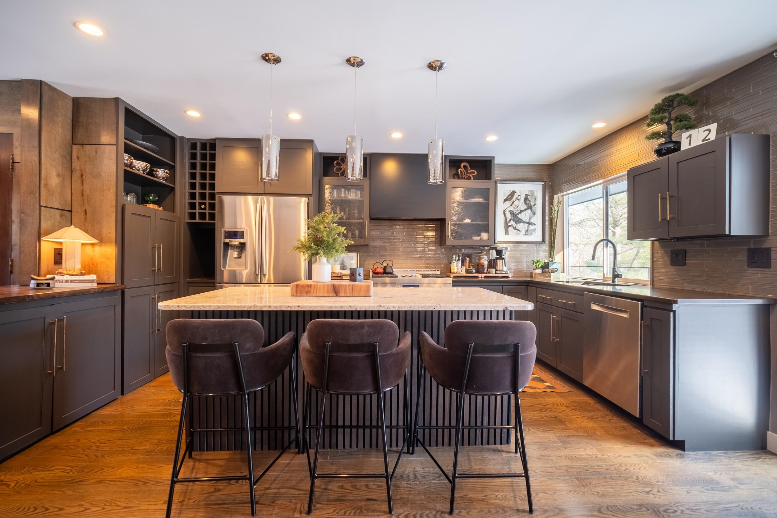 6811 West Gate Road Roscoe, IL 61073 - Photo 6 of 61 a kitchen with stainless steel appliances granite countertop a sink and a refrigerator