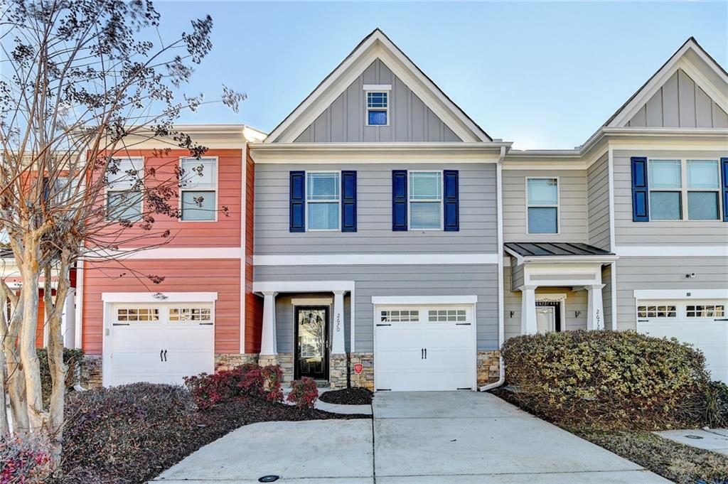 2670 Avanti Way Decatur, GA 30035 - Photo 1 of 1 a front view of a house with a garden