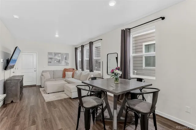 a view of a livingroom with furniture and window