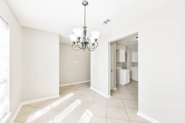 a view of a chandelier in a room