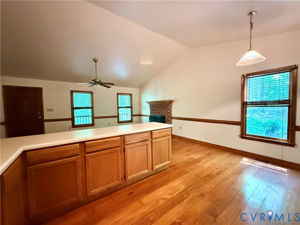 2590 Davis Mill Road Goochland, VA 23063 - Photo 12 of 33 a large kitchen with kitchen island a large counter top space a sink and stainless steel appliances