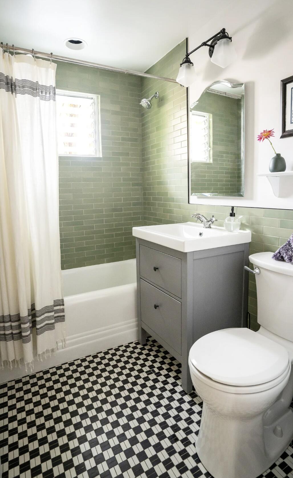 1608 Bath Street Santa Barbara, CA 93101 - Photo 10 of 15 a bathroom with a toilet a sink and bathtub