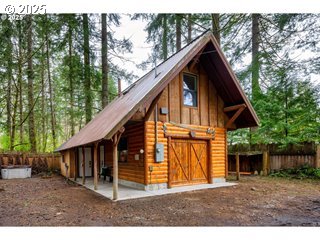 67930 East Stage Stop Road Welches, OR 97067 - Photo 25 of 43 a backyard of a house with wooden fence