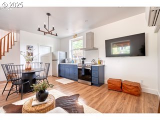 67930 East Stage Stop Road Welches, OR 97067 - Photo 30 of 43 a bed room with a bed and a chandelier