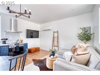 67930 East Stage Stop Road Welches, OR 97067 - Photo 31 of 43 a living room with furniture and a flat screen tv