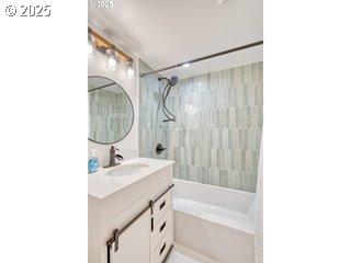 67930 East Stage Stop Road Welches, OR 97067 - Photo 38 of 43 a bathroom with a sink a mirror and a shower