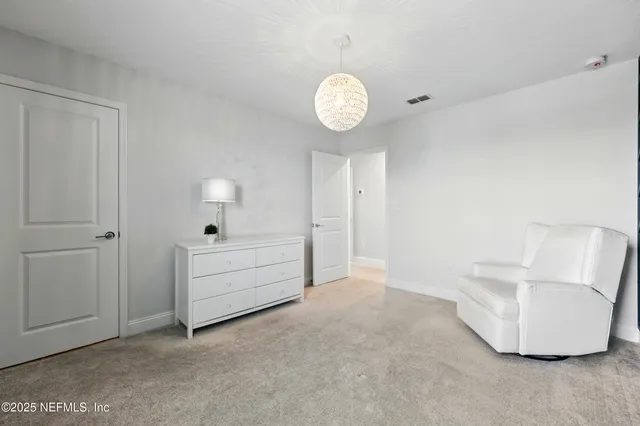 a room with a cabinet and mirror