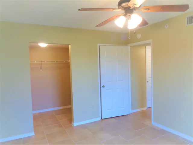 a view of walk in closet with window