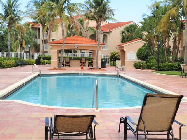 a room with furniture and a large window