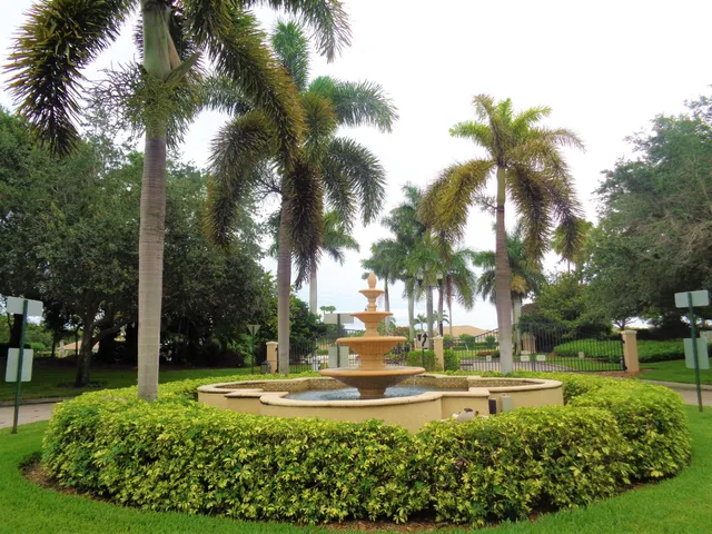 a view of a patio with a dining table and chairs