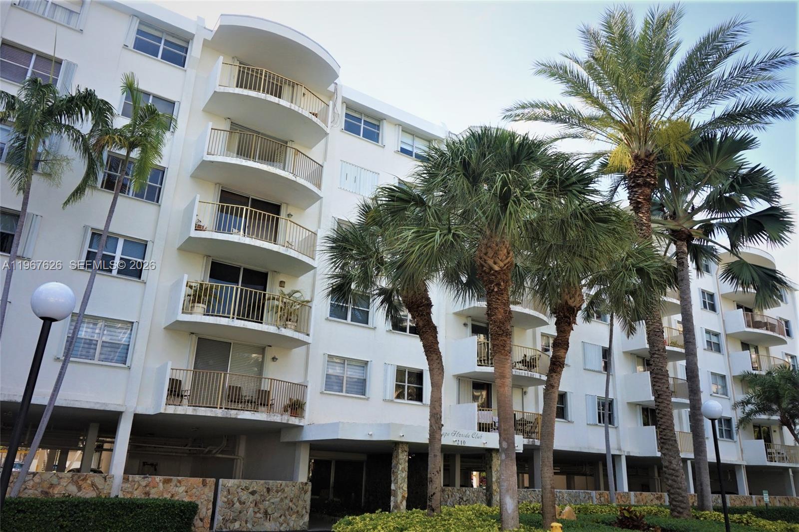 210 Seaview Drive, Unit 408 Key Biscayne, FL 33149 - Photo 33 of 34 a front view of a multi story building