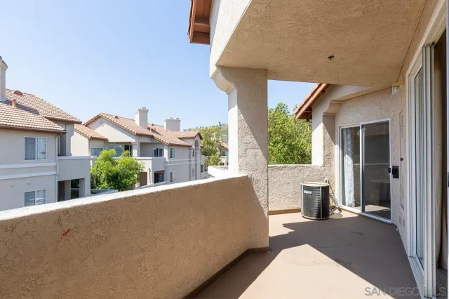 a view of a house with a mountain in the background