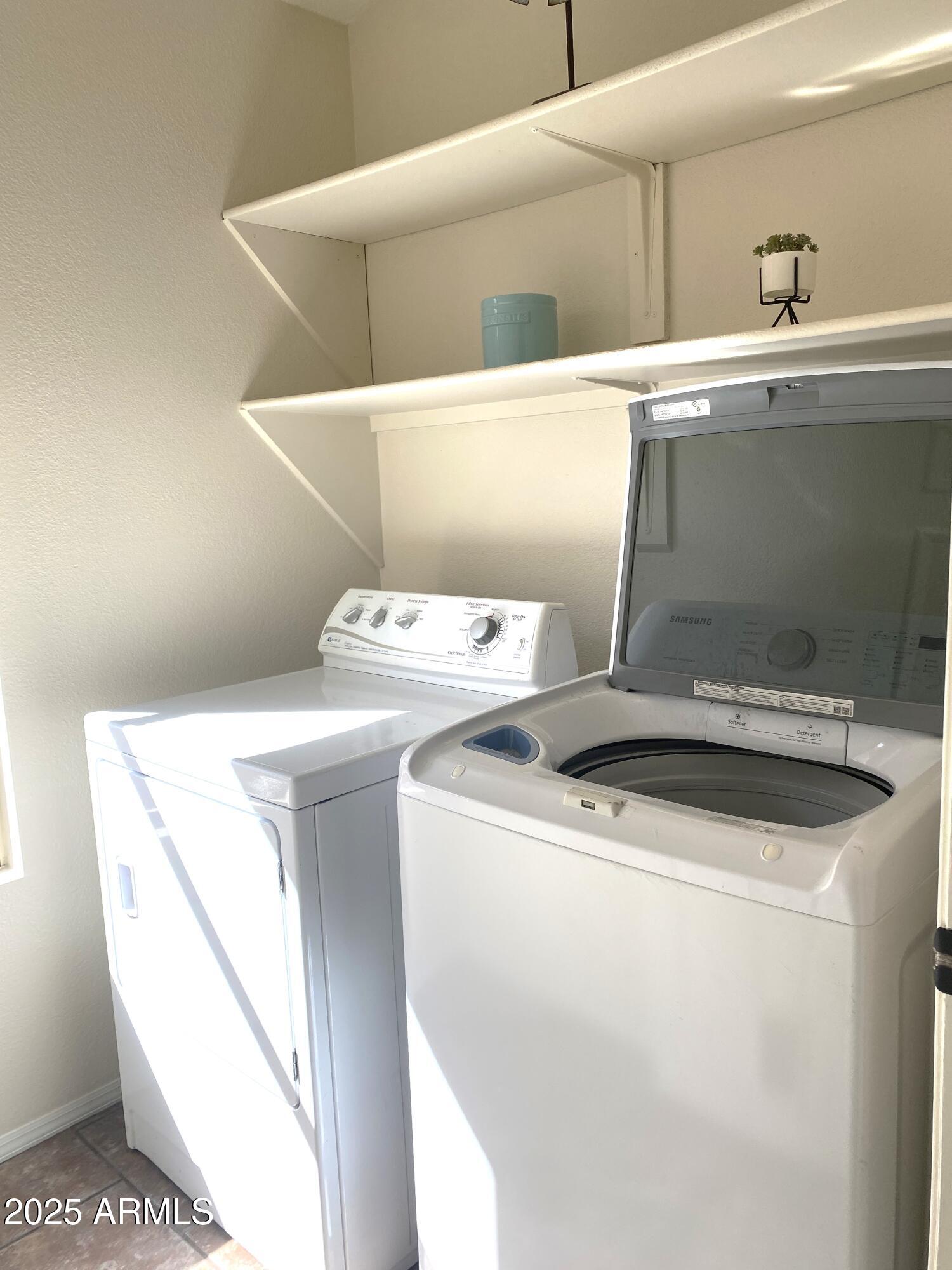 15017 South 25th Way Phoenix, AZ 85048 - Photo 14 of 18 a utility room with dryer and washer