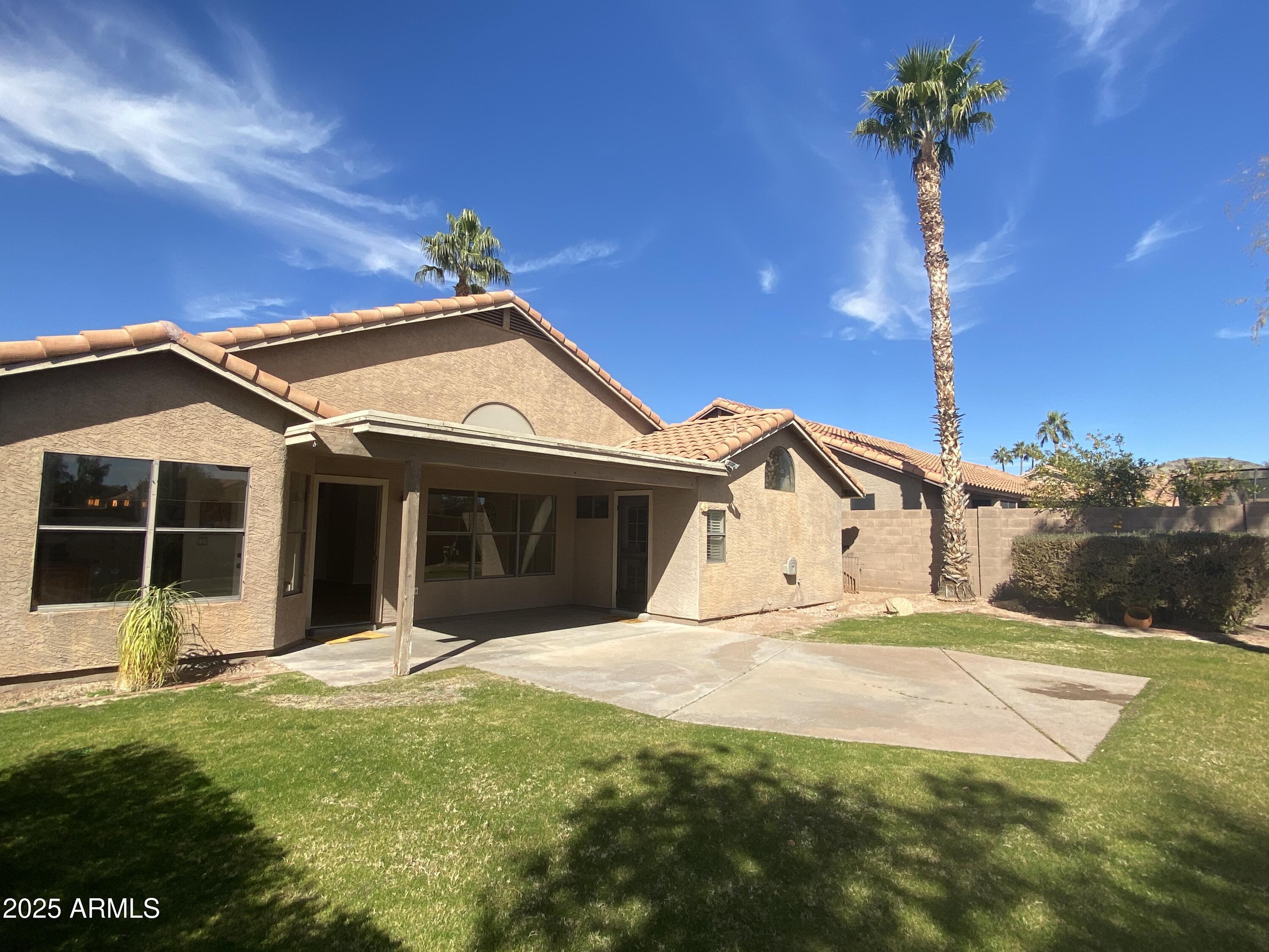 15017 South 25th Way Phoenix, AZ 85048 - Photo 18 of 18 a view of a house with a yard