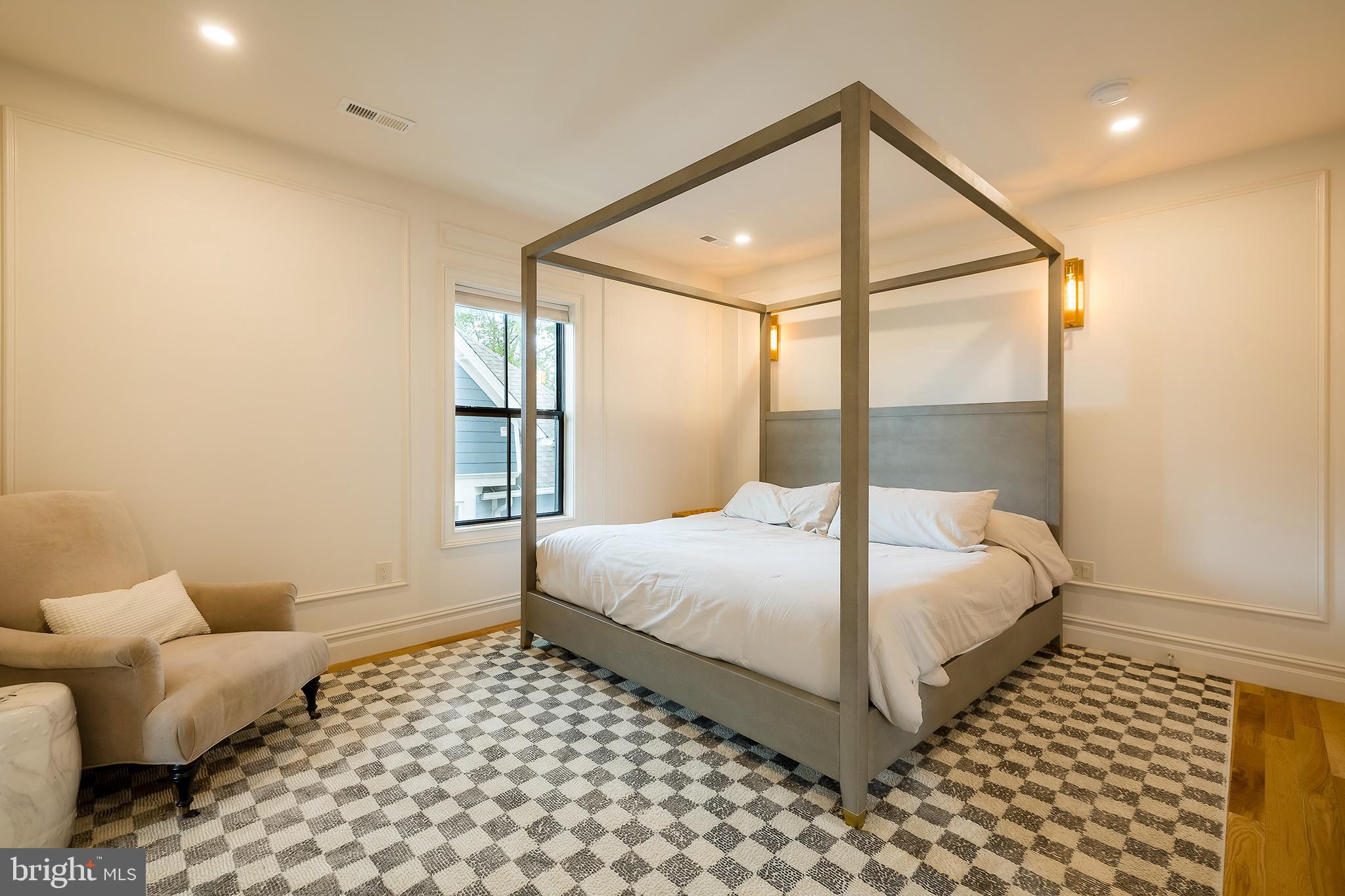 1207 Randolph Street Northeast Washington, DC 20017 - Photo 20 of 47 a bedroom with a large bed and a window