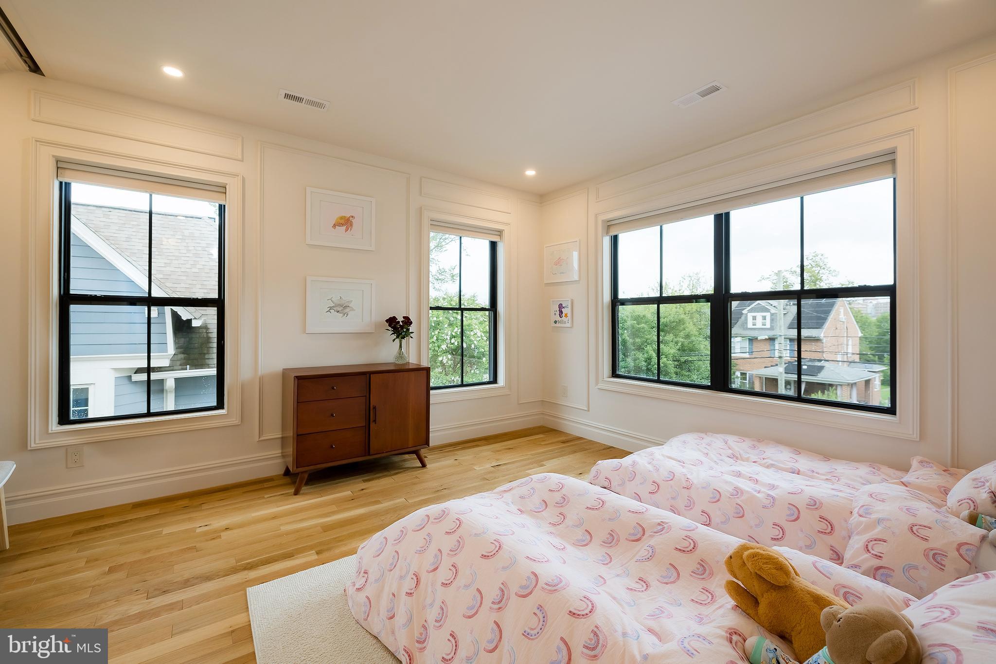 1207 Randolph Street Northeast Washington, DC 20017 - Photo 29 of 47 a bedroom with a bed and a large window